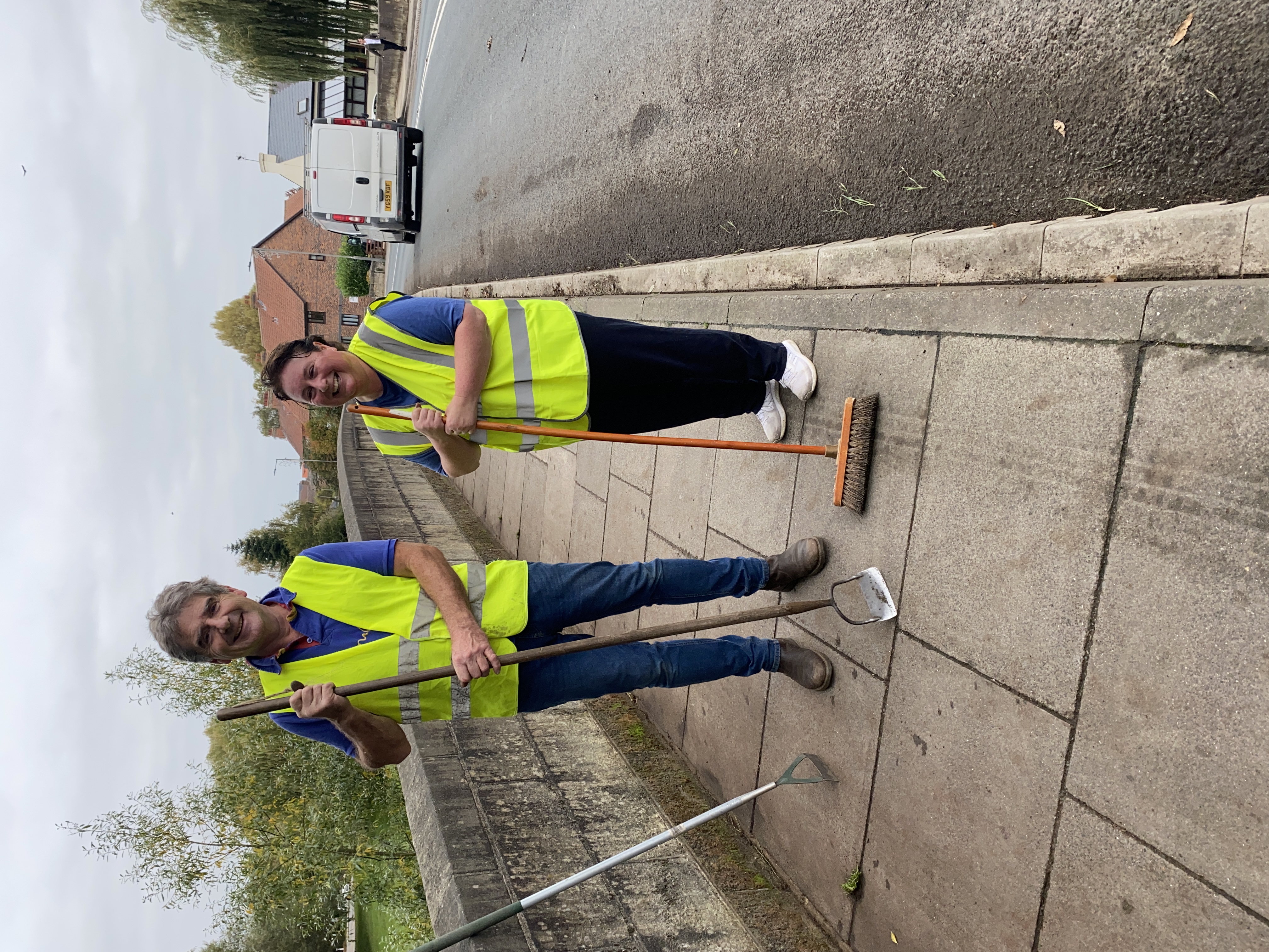 Clearing the weeds on the bridge